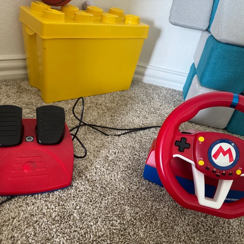 Limited edition animal crossing Nintendo switch. With racing wheel included